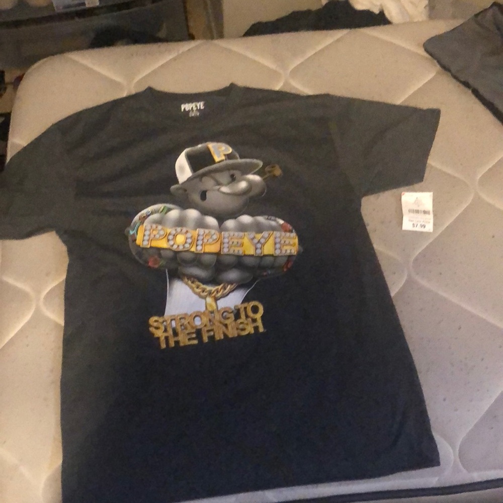 I am selling a Popeye Shirt